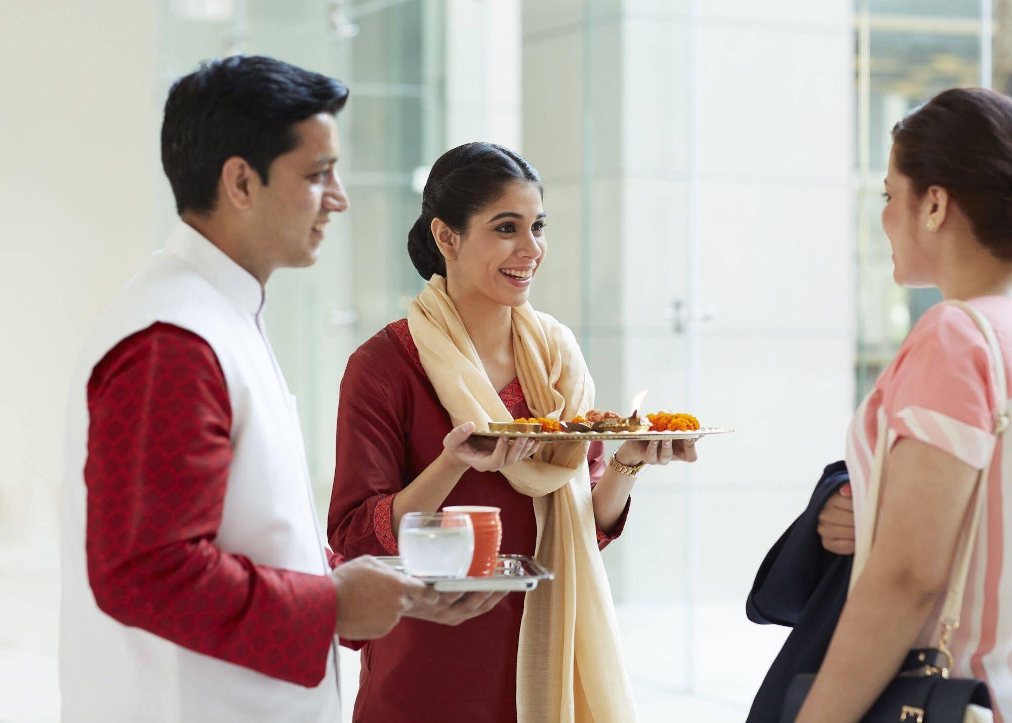 Taj Swarna, Amritsar Hotel Exterior photo Indian people greeting each other